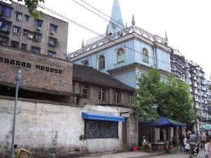 From the back, you can still see the 1910's sanctuary with the original Chinese tiled roof. 