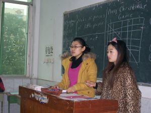 Our Christmas Bingo:  Student winners take turns to call out the symbols for another game start.