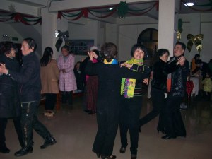 After pews were pushed aside, many worked off all the food they'd eatten by ballroom dancing to Christmas music.