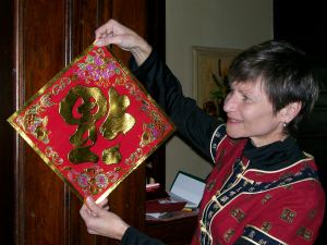 I display the "fu" (happiness) character, upside down, which I will soon put on our front door.