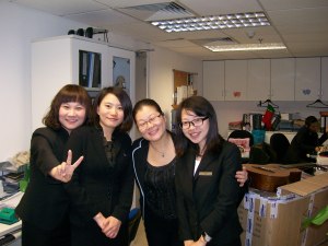 Nancy with the staff working under her.