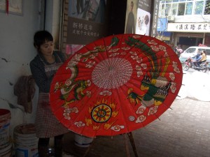 Completing one of many for the day, our local artisan continues with her work.