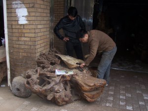 A traditional Chinese furniture maker at work.