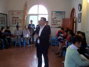 In the choir room, John leads us on last-minute rehearsals.