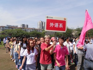 Having some fun:  That's me, holding Foreign Language Departmental sign for our English majors.