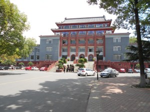 Graduates posed on the steps of the main administrative building for an impressive photo of their alma mater.