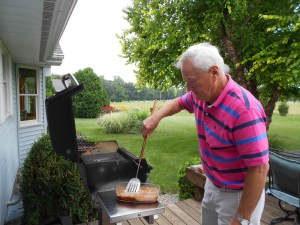 Charles (Chuck) Wieck, my dad's younger brother, at the grill.