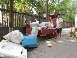 Loading up the recycle truck takes some time and energy on everyone's part.