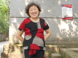 Mrs. River (Ms. Wu) helps her husband load up the recycle truck after everything is in proper order.