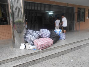 Some students arriving by bus had their luggage  from home picked up by campus trucks  at the station and delivered to their dorms.   