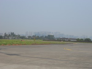 The first runway in China, with distant Luzhou in the background.