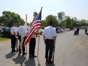 3 rounds are fired (line of riflemen in the distance)