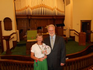At Reynolds UMC, considered the "city" church, Pastor Paul Newhall and I pose for a picture in the sanctuary.