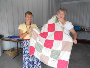 I'm presented with a handmade prayer quilt.  Perfect to keep me warm on those chilly Sichuan evenings.