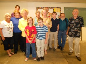 Luncheon at Woodside UMC, with Pastor Linda in yellow jacket.