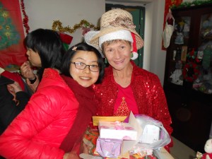 Teacher Sun and me, showing off my trendy straw hat which was a Christmas gift.