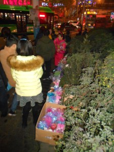 Sellers up and down the crowded streets selling "peace" apples in Luzhou