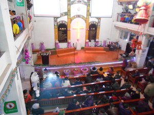 Getting ready for Christmas Eve worship:  The Luzhou Protestant Church (1913)