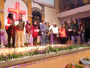 Singing "Joy to the World":  the medical college foreign students.