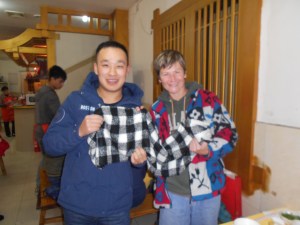 Jason (Ji Ke) presents me with a warm scarf.