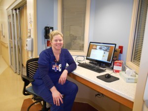 Ashley, one of my dad's ICU nurses, at her station outside my dad's room.  Excellent care-giver!