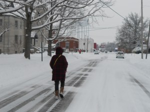 My mom, approaching the Marshall UMC on the left.