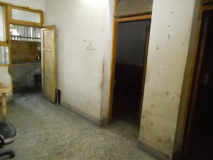 The Wangs apartment after moving out. (Notice the mold on the walls.)