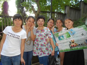 The Wang's daughter (center) with students came to finish cleaning everything out.